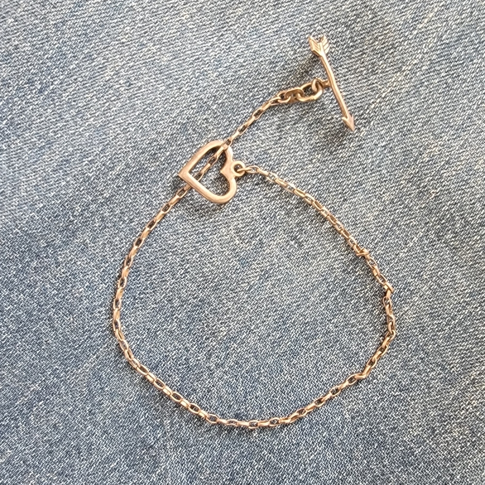 Vintage silver bracelet with heart and arrow
